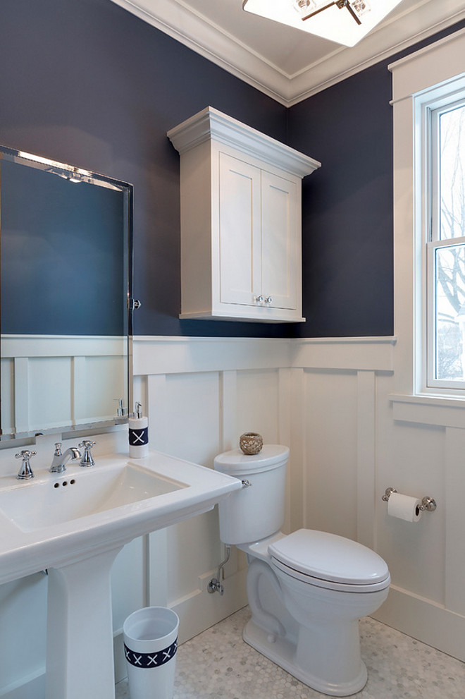 Alternatively, this bathroom shows White Dove pairing with a navy blue. The navy's gray undertones are brought out by the gray in the White Dove. 