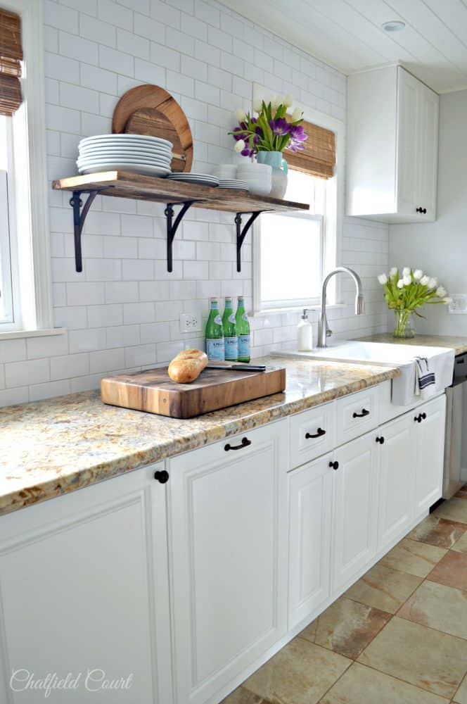 Here's another kitchen remodel, this time from Chatfield Court. This White Dove kitchen shows how it can pair with any color. The wood accents and light floors do just as well with White Dove as the darker accents in the previous kitchen. 