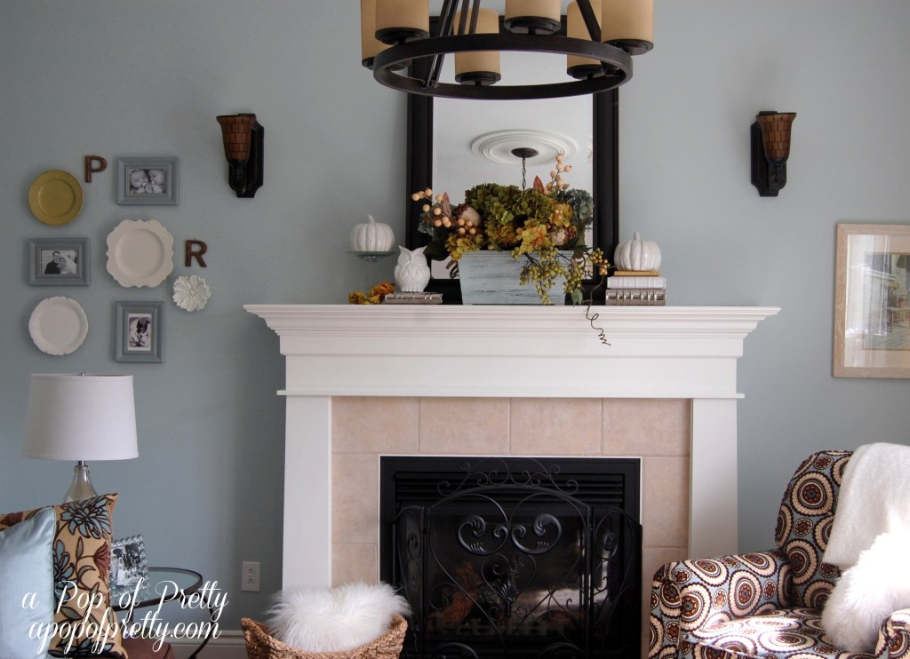 white, purple and gold fall mantel