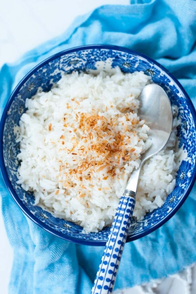 Blue bowl of coconut rice made in the instant pot