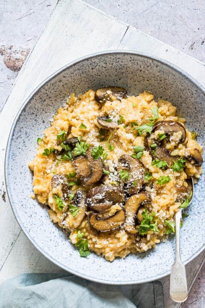 mushroom risotto recipe in a blue bowl